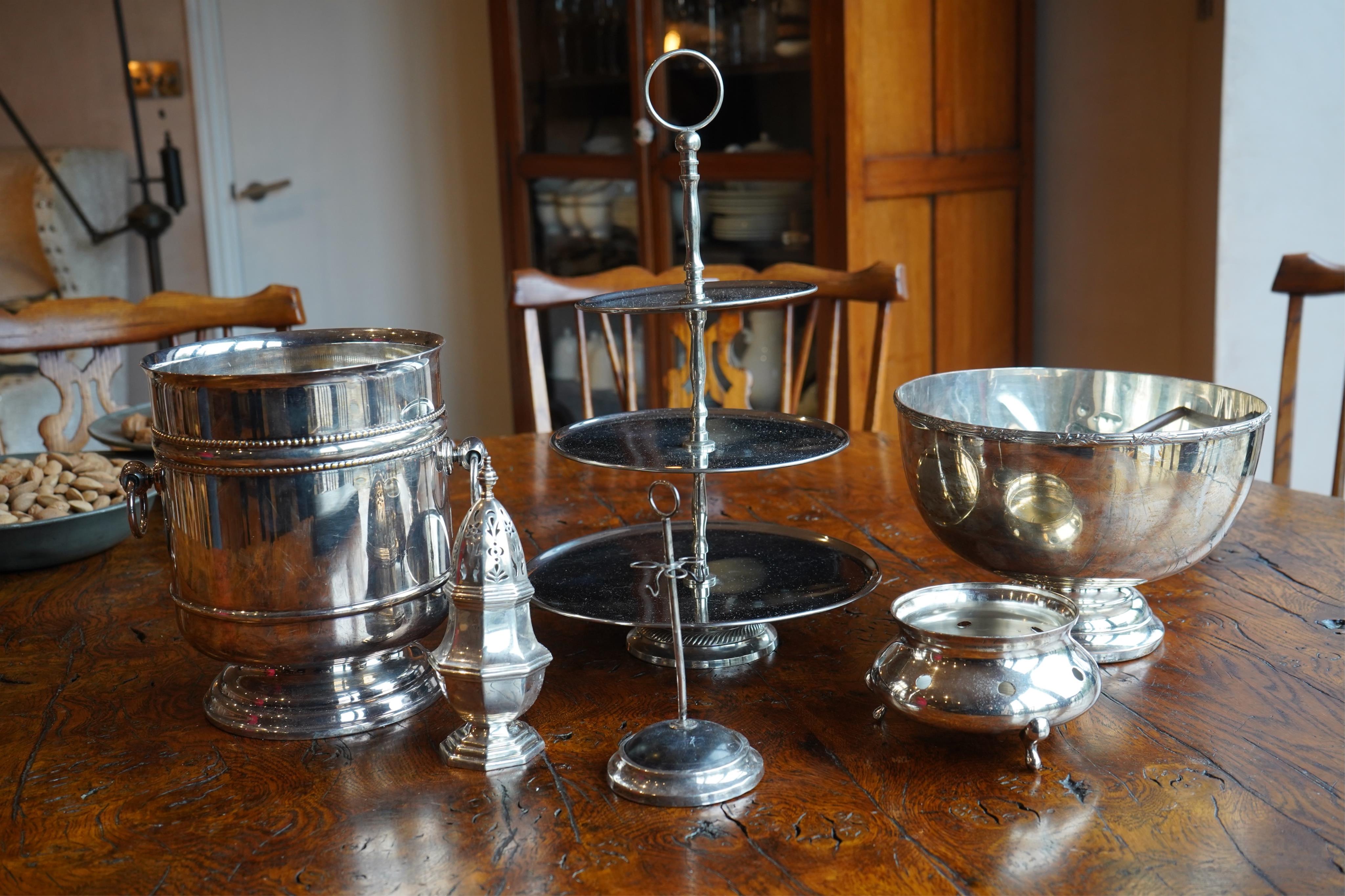 A quantity of plated wares and some silver including a ring stand, sugar sifter etc. Condition - varies